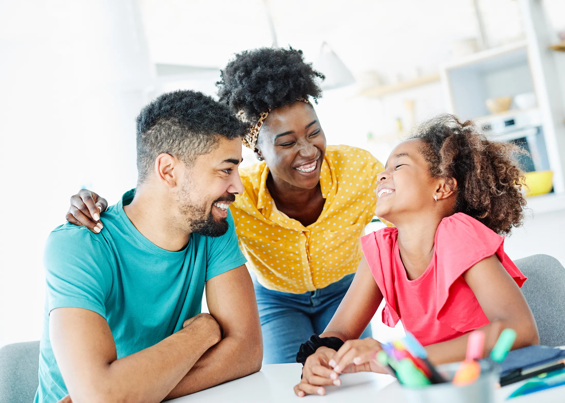 child daughter family happy mother father black homework education fun together girl cheerful