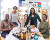 A group of people satisfied after an art therapy session and lessons on how art therapy can help with anxiety.