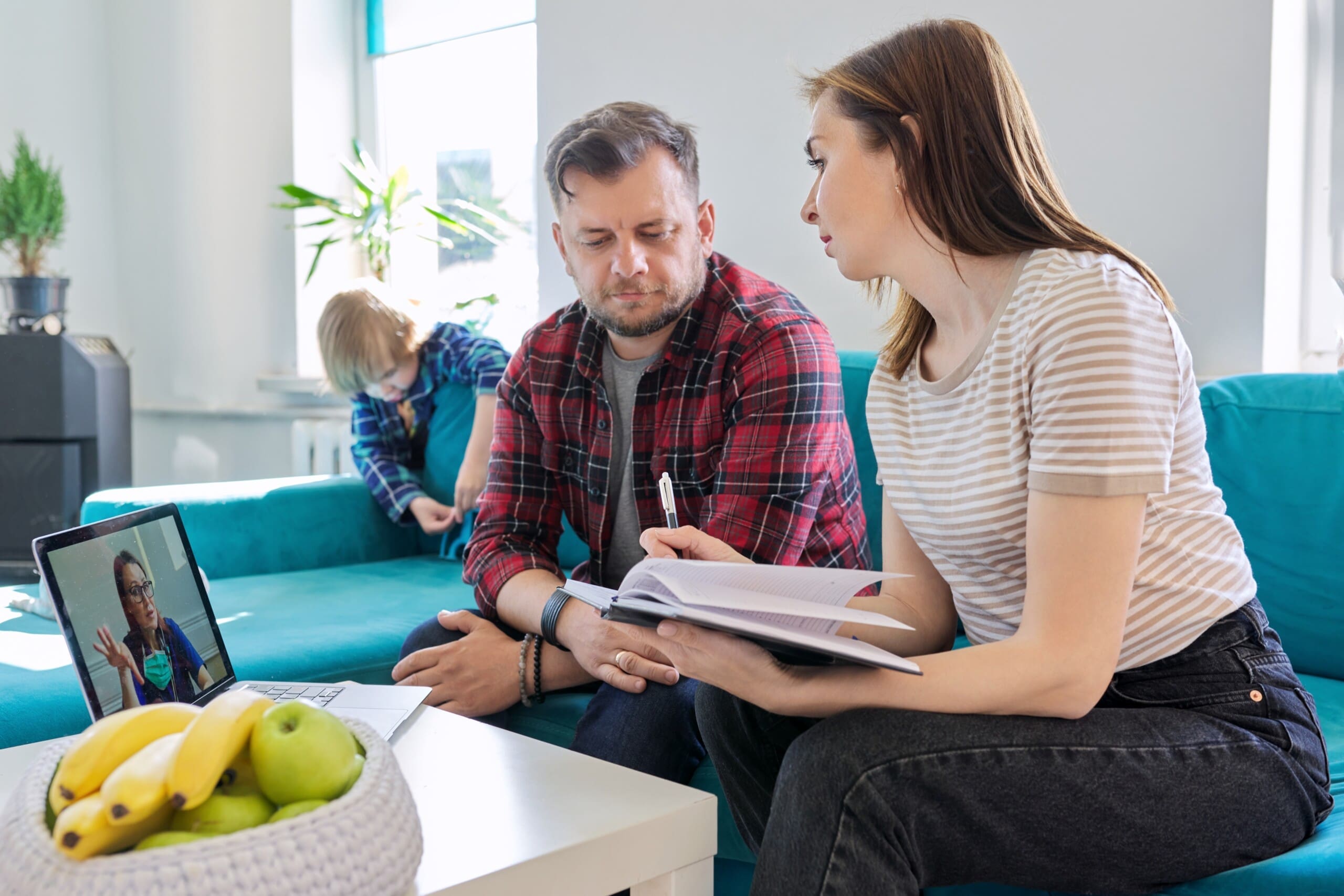 Parents on a telehealth call with doctor