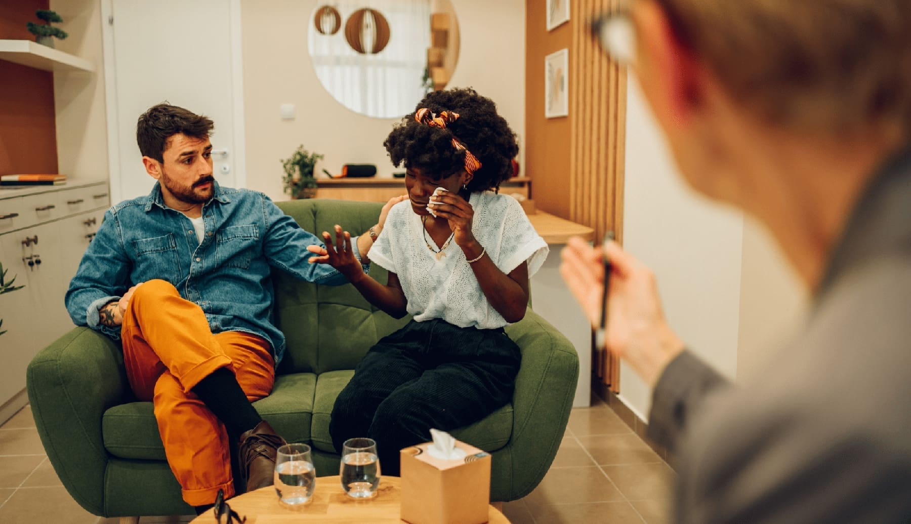 Diverse couple on a therapy session in a psychologist office